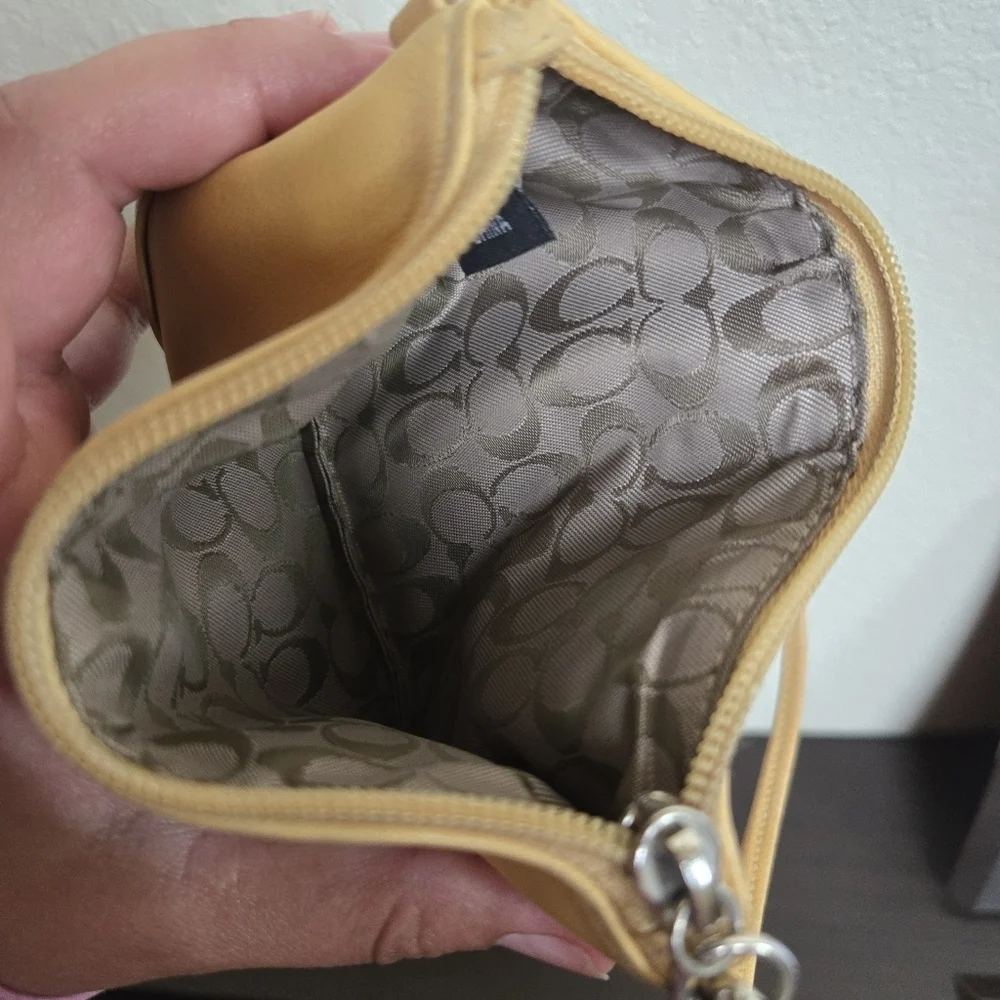 Coach yellow leather wristlet